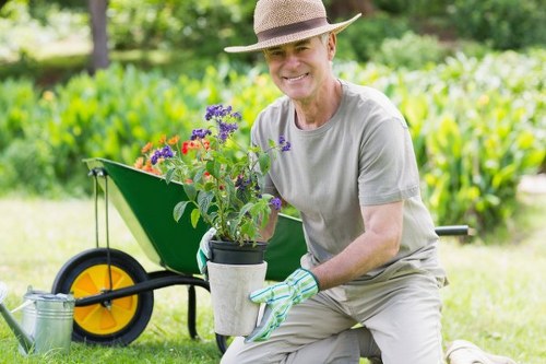 Gardener selecting healthy plants for a lush garden